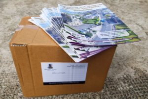 Box of printed newsletters